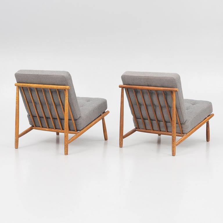 Alf Svensson, a pair of "Domus" lounge chairs, Dux, Sweden, 1950's.