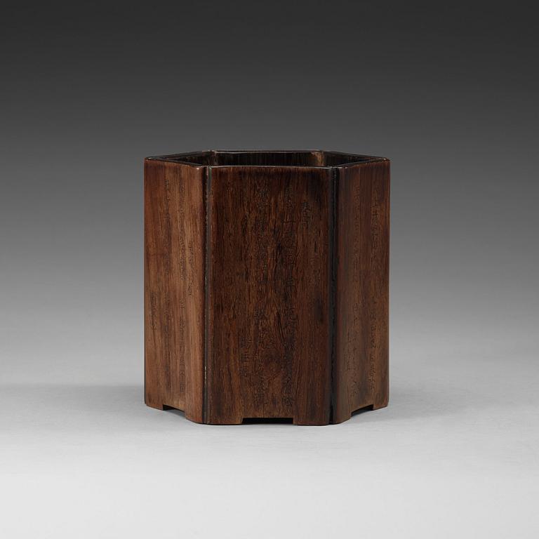 A Chinese wooden brush pot with inscriptions, 20th Century.