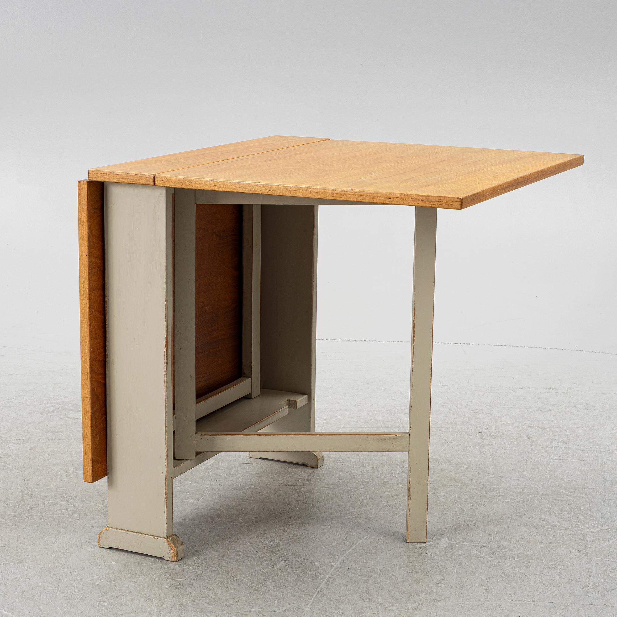 Carl Malmsten, a drop-leaf table, "Vapensmeden", second half of the 20th century.
