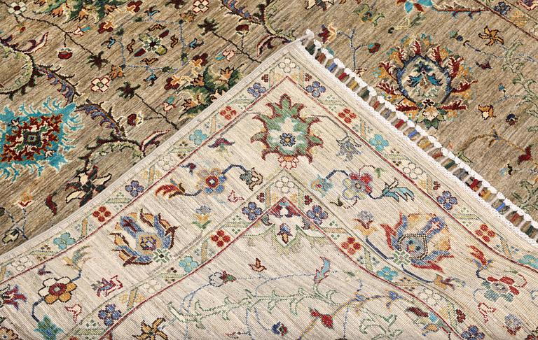 A rug, Zigler design, approx. 239 x 173 cm.