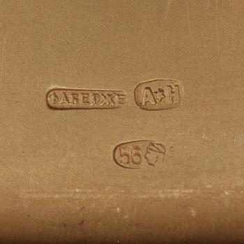 A Russian gold and dimond puder-box, marks of FABERGÈ and August Hollming, St. Petersburg early 20th century.