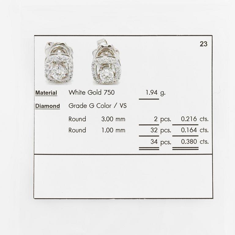 Earrings, two-part 18K white gold with brilliant-cut diamonds.