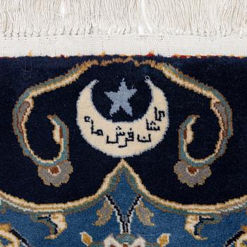 A Royal Keshan carpet, signed, c. 395 x 295 cm.