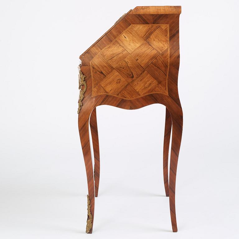 A rococo parquetry secretaire, Stockholm, later part of the 18th century.