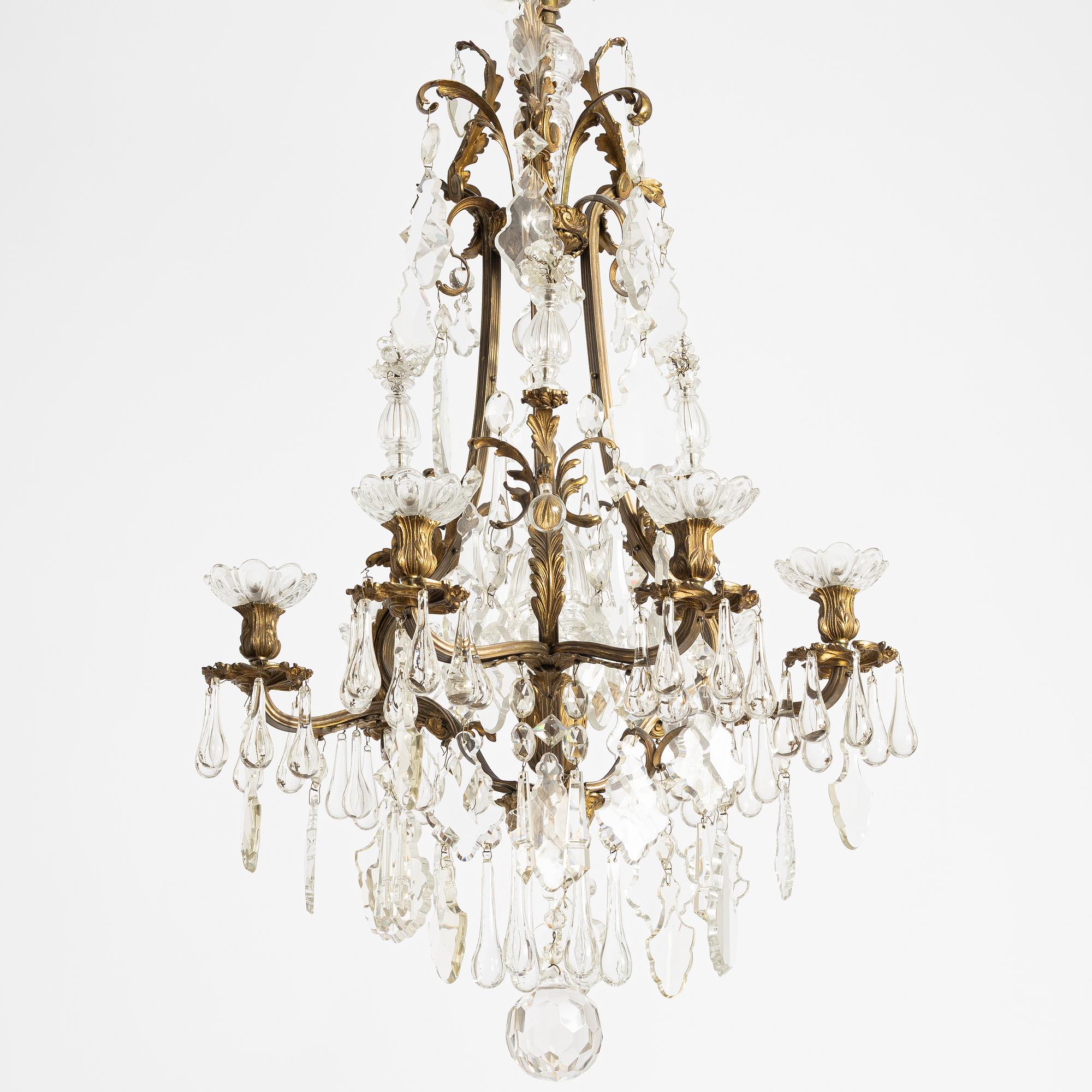 A six-branch rococ-style chandelier, first part 20th century.