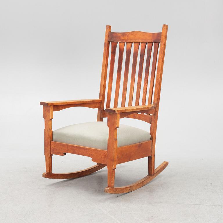 Gustav Stickley, after. A 'Bungalow Rocker' rocking chair, early 20th Century.