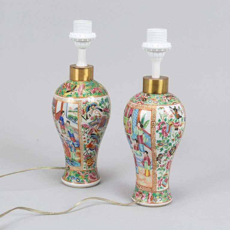 A pair of famille rose Canton table lamps and a pair of vases, late Qing dynasty, 19th Century.