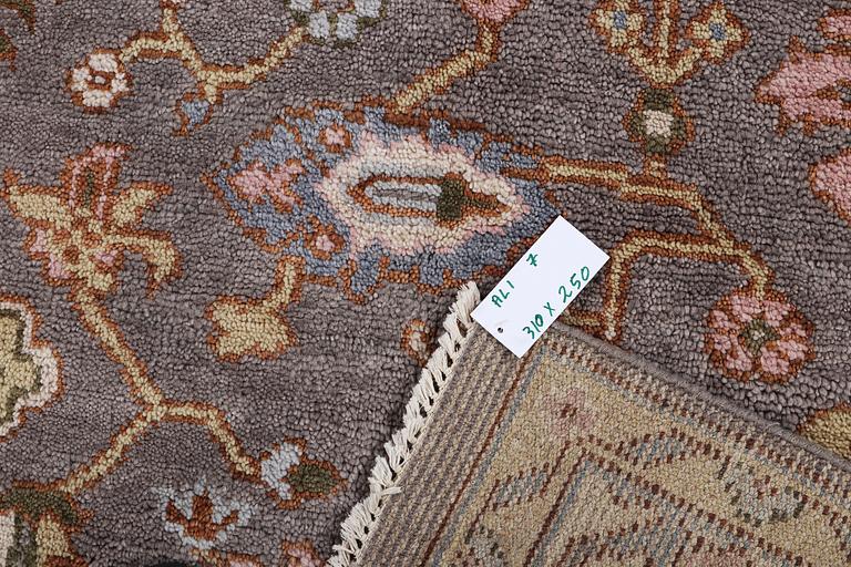 An oriental carpet of Safavid design, c. 310 x 250 cm.