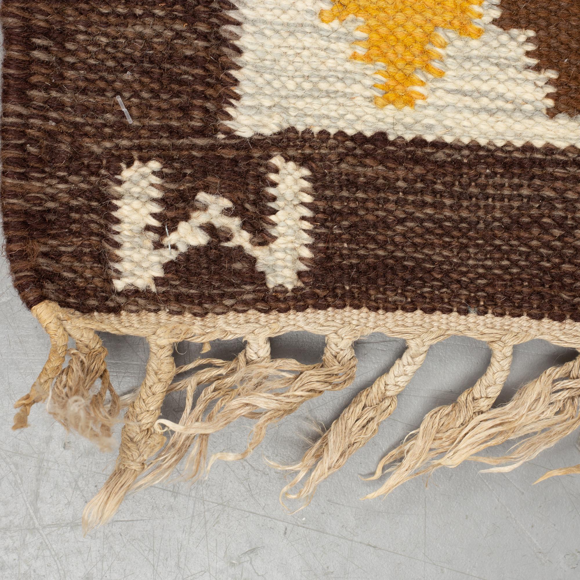 A carpet, flat weave, ca 199 x 135-137,5 cm, signed W.
