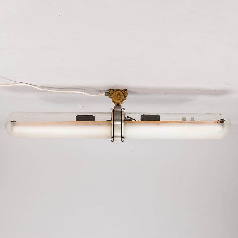 A mid 20th Century Finnsh industrial light for Metallivalmiste Oy.