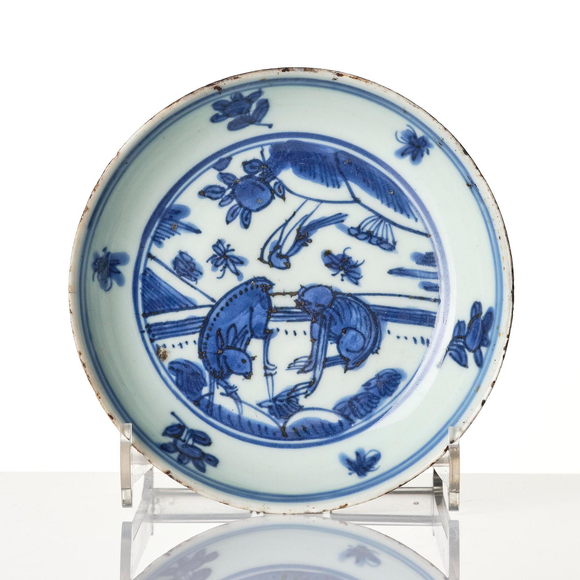 A blue and white 'floral' bowl and a dish, Ming dynasty, Jiajing (1522-1566).