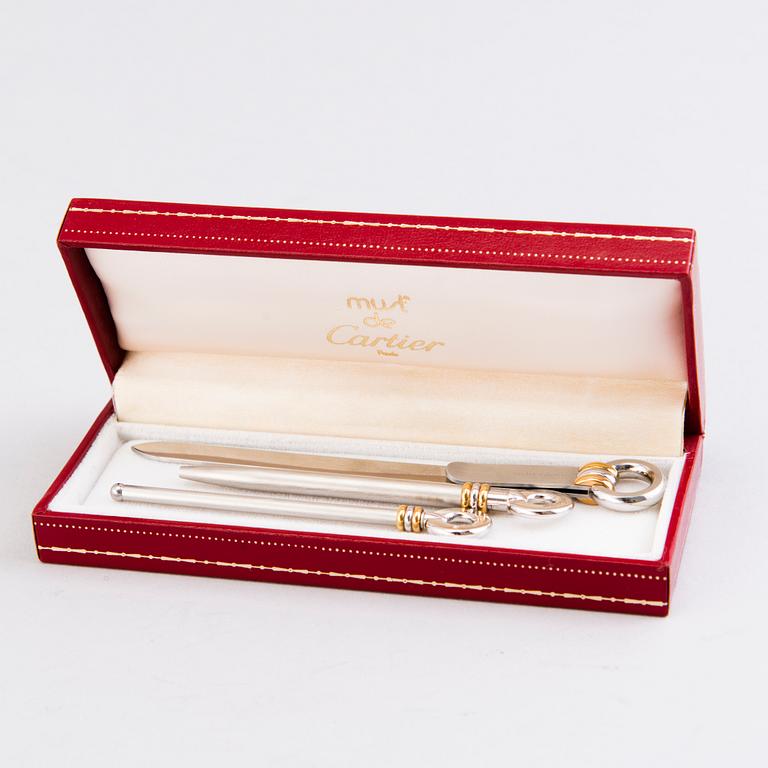 A PEN, CHAMPAGNE BEATER and BOOK MARK, must de Cartier.