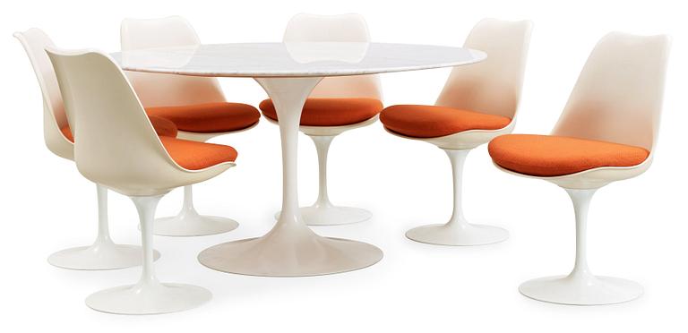 An Eero Saarinen 'Tulip' marble top table and six chairs, Knoll International.