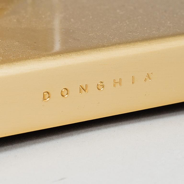 A 'Esha Alta' glass and brass table lamp from Donghia lightning.