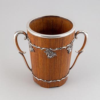 A wood and silver champagne cooler, Turku, Finland, 1956.