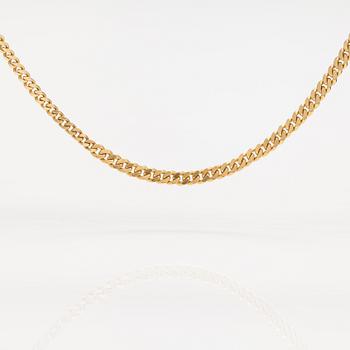 A 14K gold neckalce. Italy.