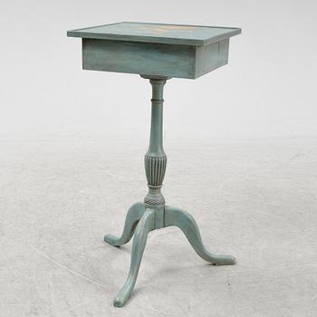 A painted late Gustavian style table with a drawer.
