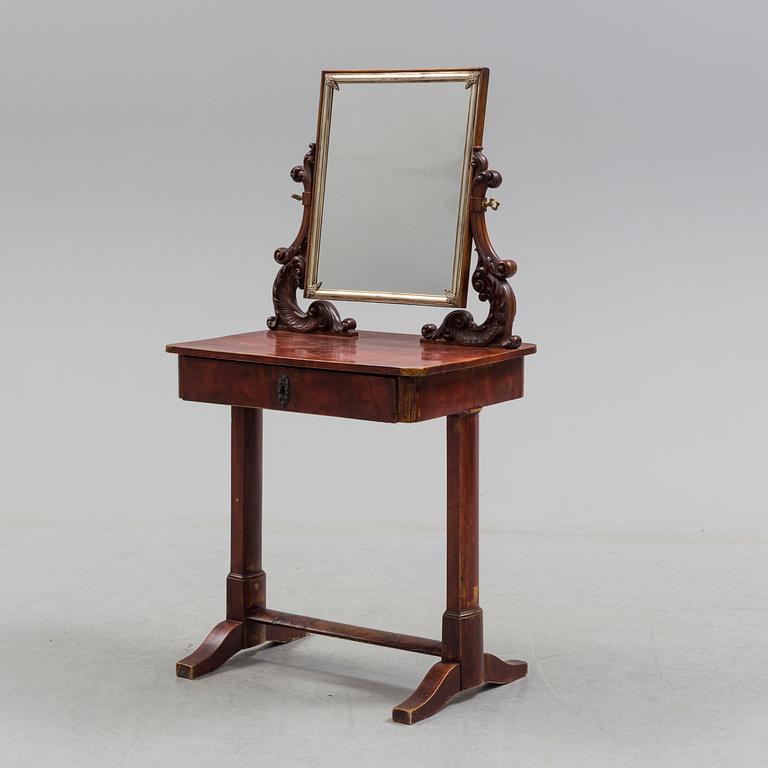 A mid 19th century late empire dressing table.