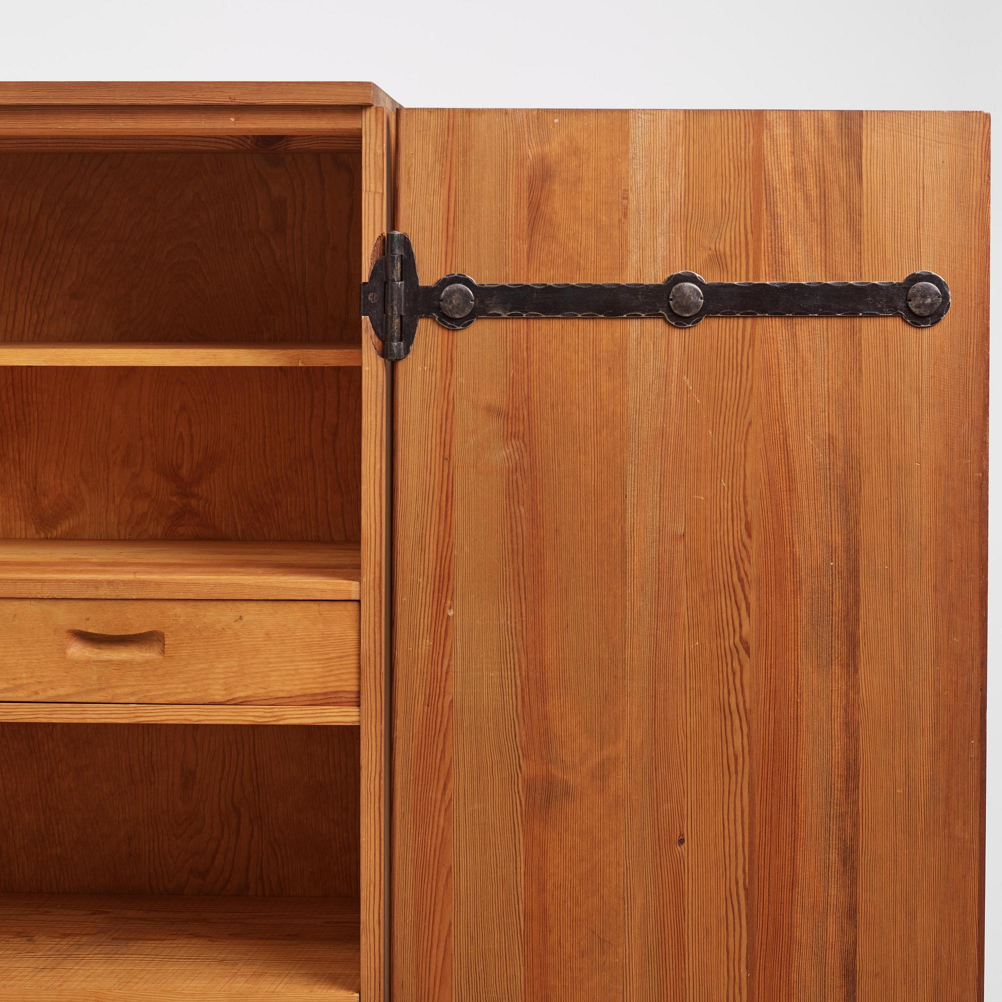 Axel Einar Hjorth, a stained pine "Lovö" cabinet, Nordiska Kompaniet, Sweden, 1930s.
