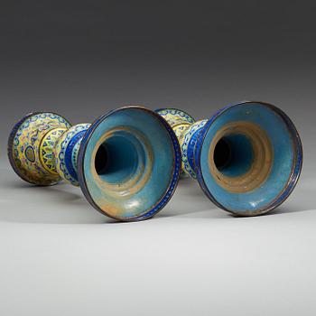 A pair of enamel on copper vases, Qing dynasty, 19th Century.