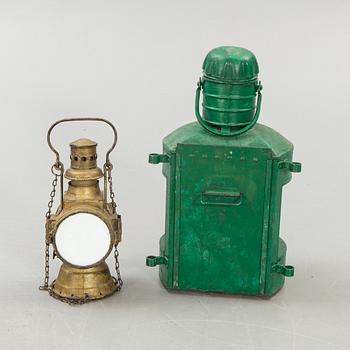 An early 1900s lantern and railway lantern.