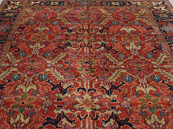 A CARPET, a semi-antique Heriz, ca 322-327 x 226,5 cm.