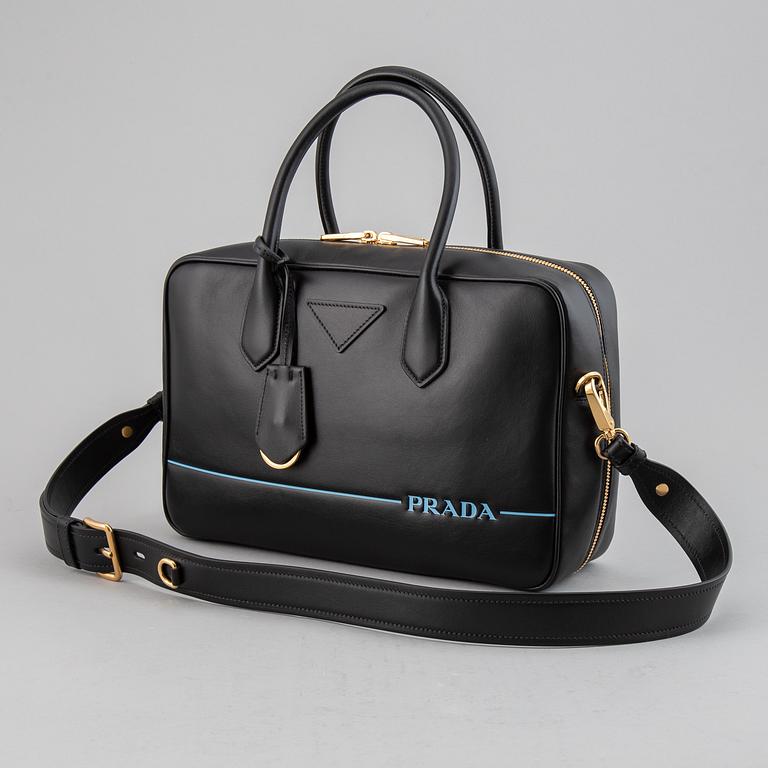 PRADA, a leather bag.