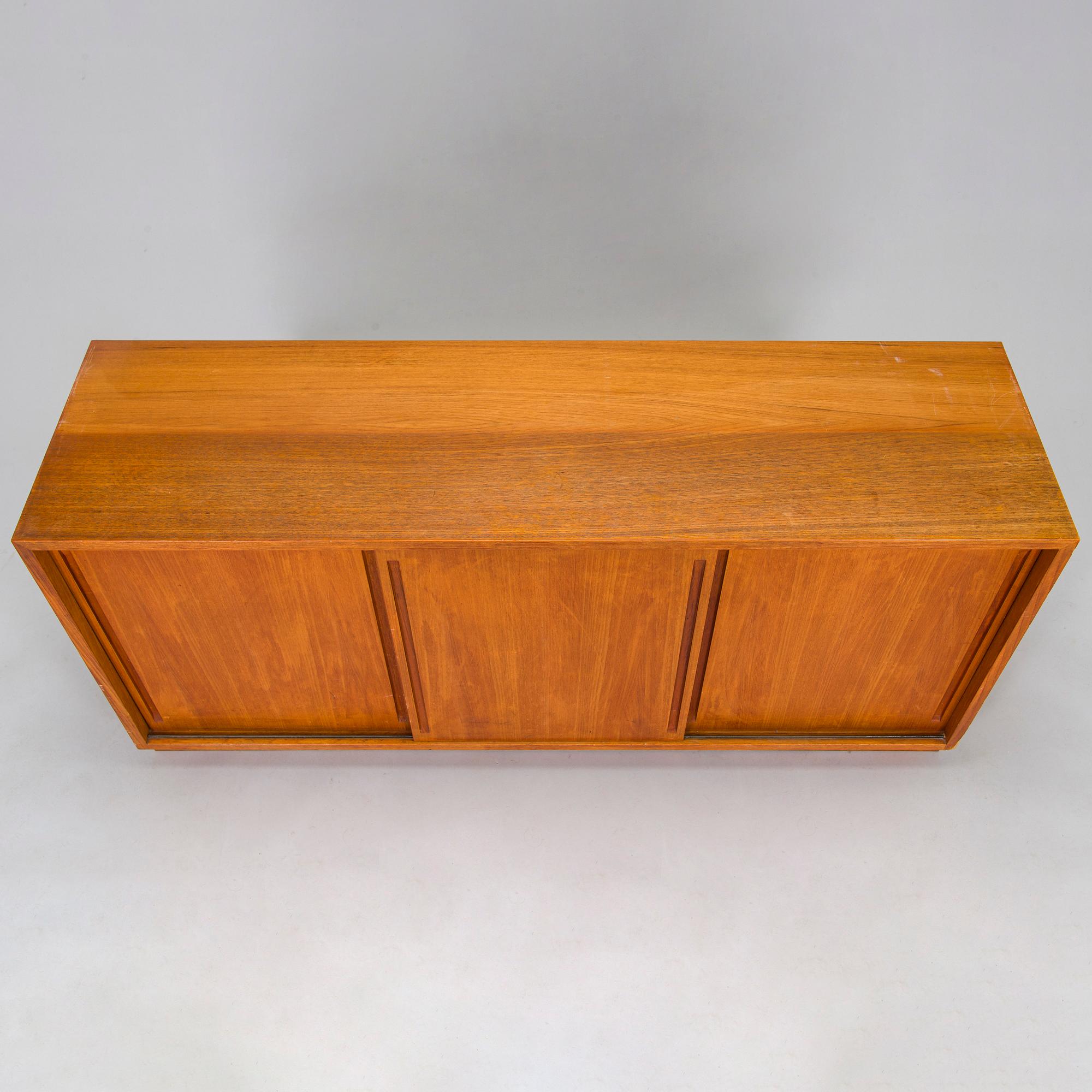 Carl Gustaf Hiort af Ornäs, a 1950's book shelf 'Lamelli' HMN Huonekaluliike Mikko Nupponen.