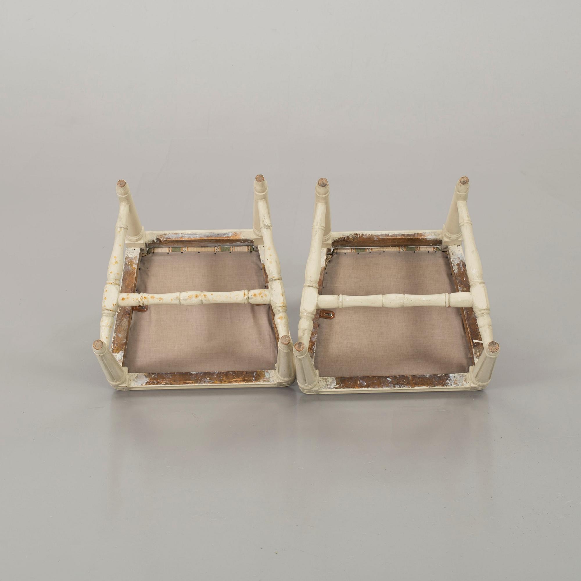 A piar of signed Swedish Gustavian chairs.