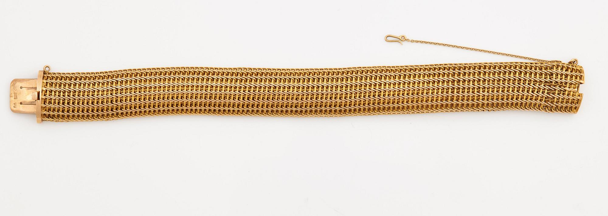 A bracelet with mesh-links.