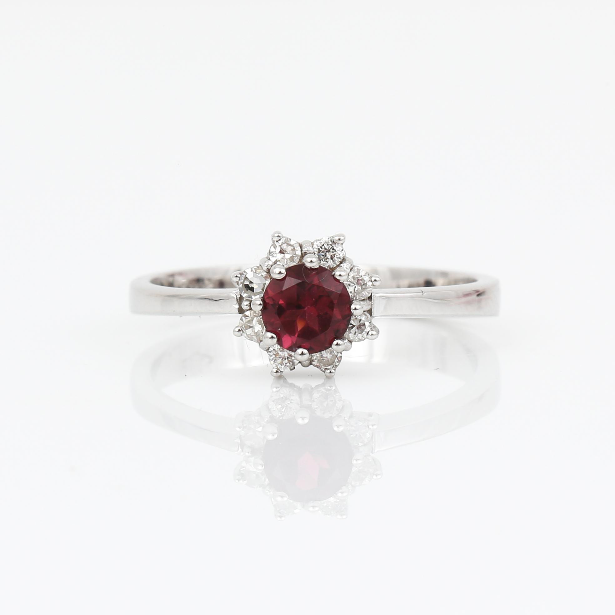 RING, 14K vitguld med fasettslipad turmalin och diamanter 0,15 ct. Vikt 2,5 gram.