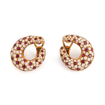 435. A pair of 18K gold earrings set with round brilliant-cut diamonds an rubies.