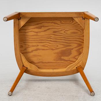 A dining table and four chairs, 1950s-60s.