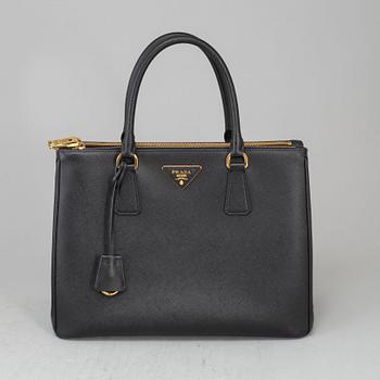 PRADA, a black Saffiano Lux 'Galleria Medium' handbag, 2018.