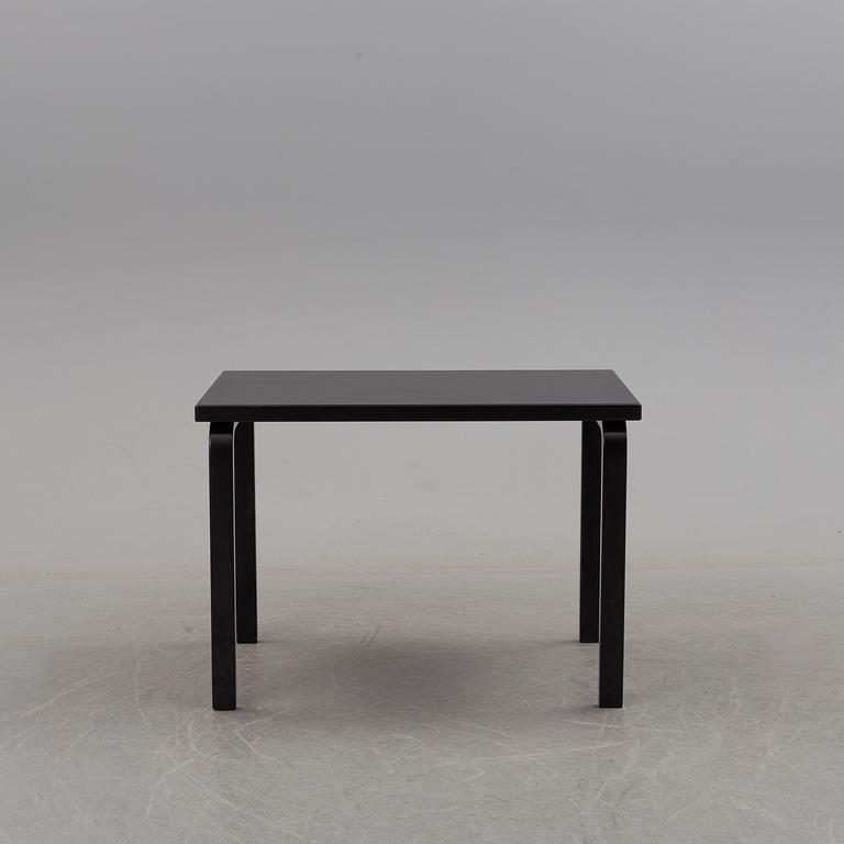 a dining table '81B' and four '69' chairs by Alvar Aalto, Artek.