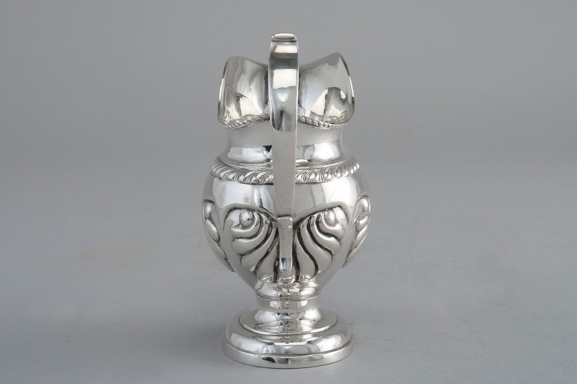 A CREAMER, silver. Roland Mellin Helsinki 1838. Height 12 cm, weight 132 g.