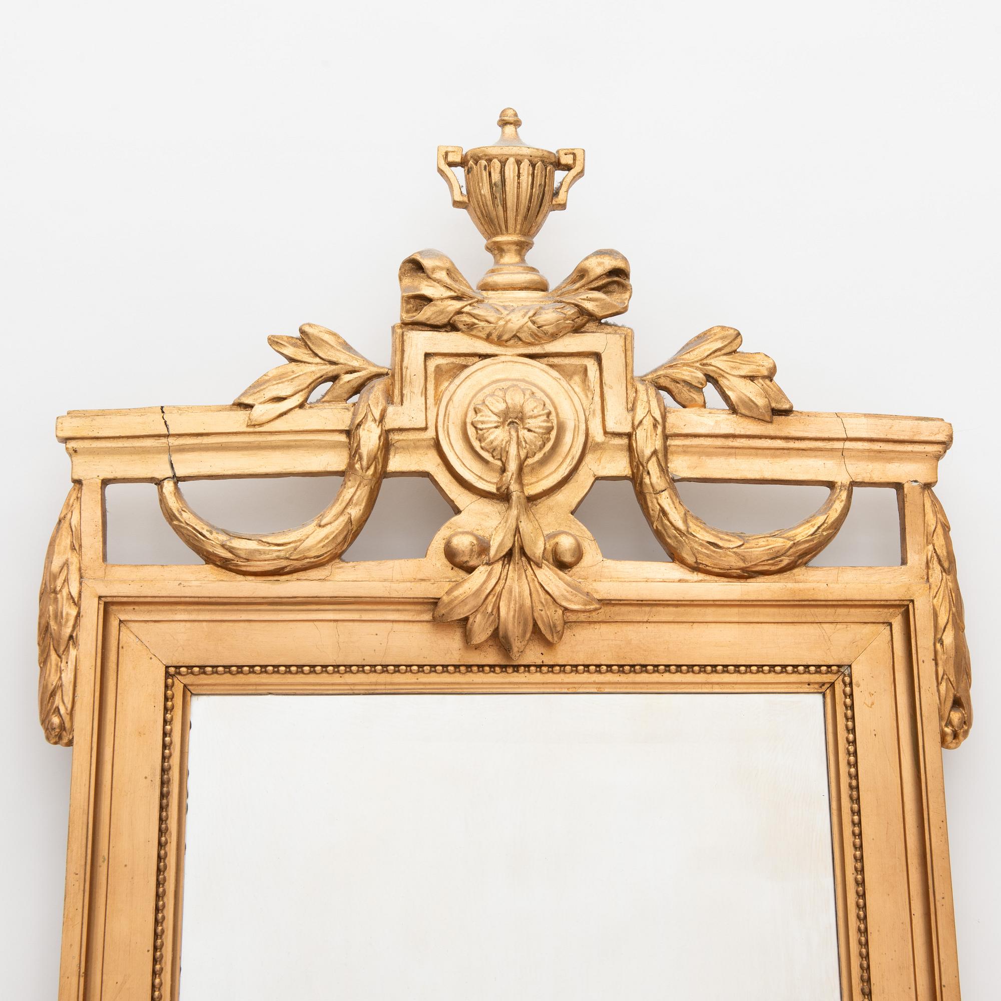 A Gustavian Style Mirror, first half of the 20th Century.