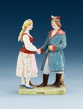 1350. A Russian bisquit figurin depicting a Polish man and woman, Gardner manufactory, ca 1900.