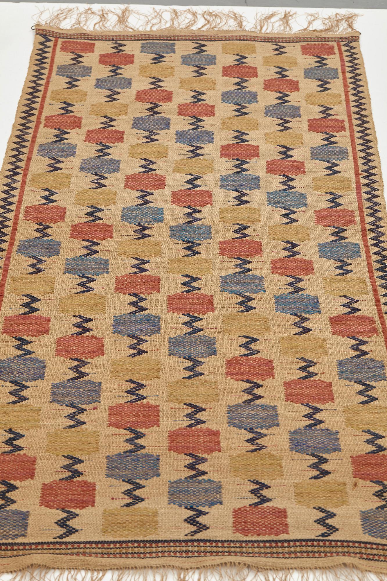 Märta Måås-Fjetterström, A TEXTILE, "Skaftblomman", flat weave, ca 192 x 76 cm, signed MMF.