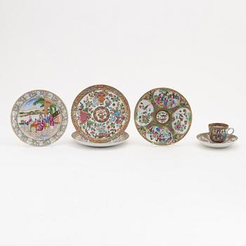 A group of four Canton plates (2+1+1) and a cup with saucer, 19th century.