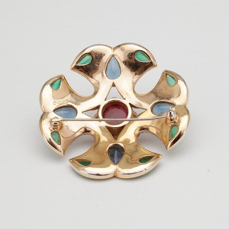 VERDURA, a gold colored brooche with multicolored stones.