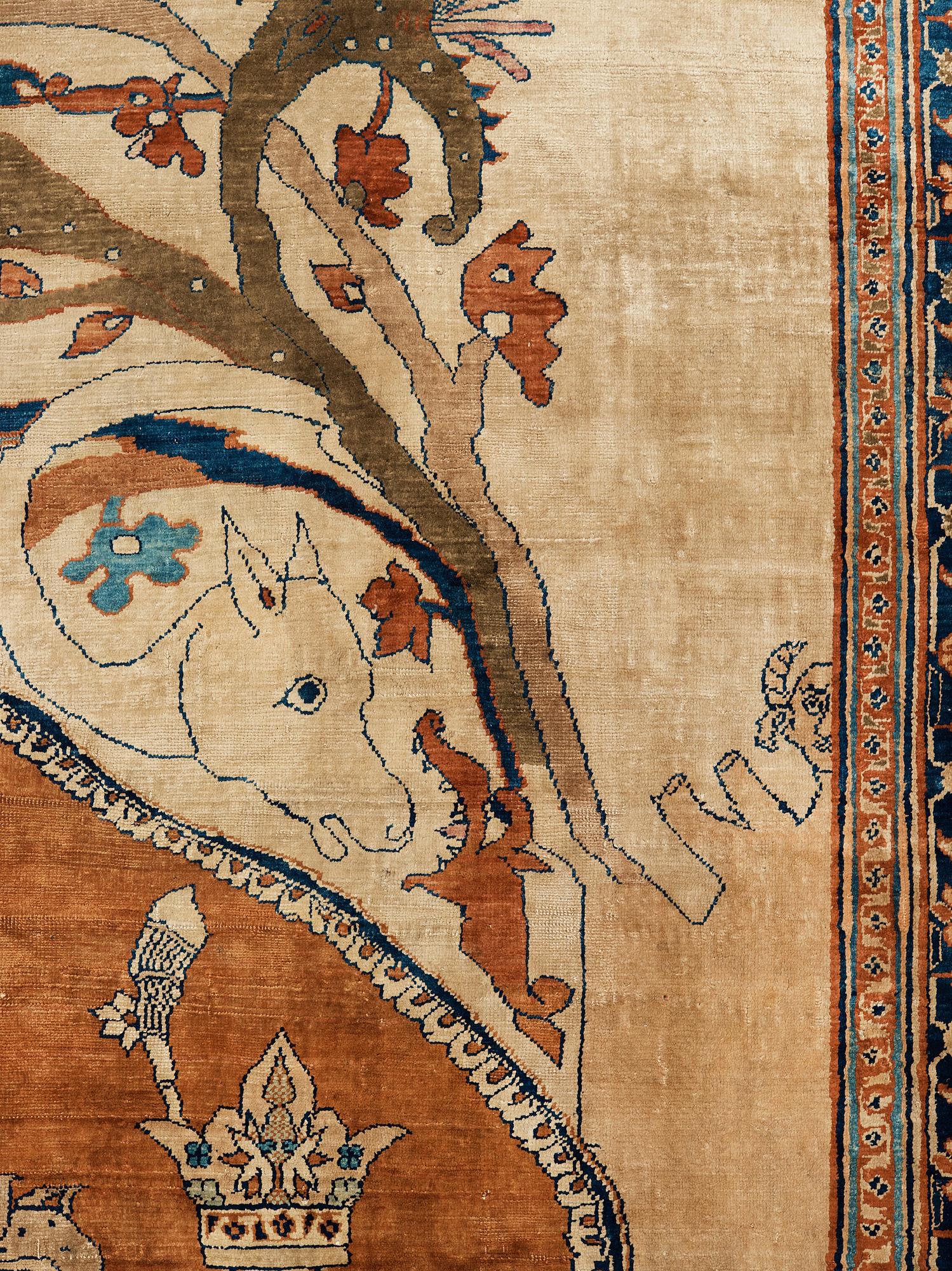 A RUG. An antique silk Heriz. 177 x 146 cm.