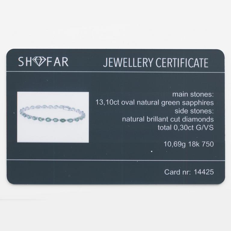 Bracelet 18K white gold with green sapphires and brilliant-cut diamonds.