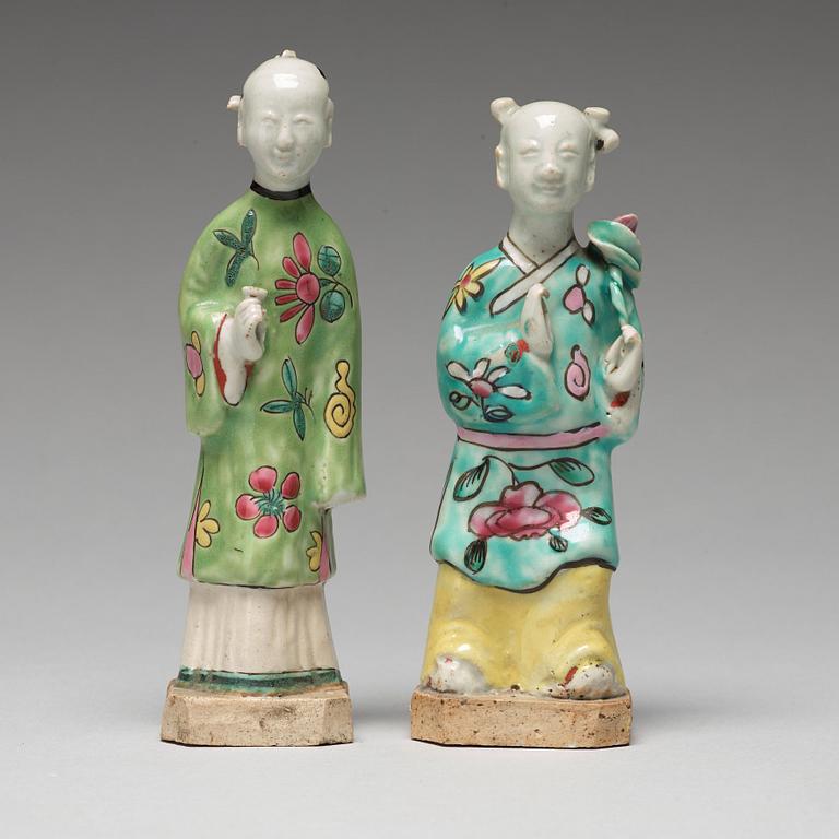 A group of eight famille rose figurines, Qing dynasty, 19th Century.