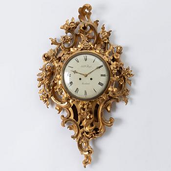 A Neo-rococo wall clock by Johan W. Berg, Karlstad, Sweden, ca. 1860.