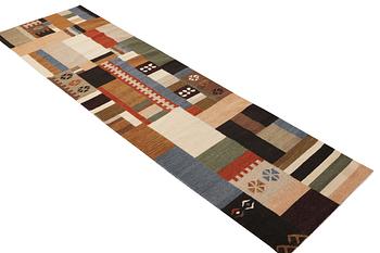 A runner carpet, Kilim, c. 297 x 84 cm.