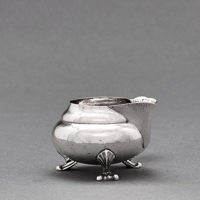 Georg Jensen, a three pieces coffee and tea service, "Blossom", Copenhagen Denmark 1915-21 830/1000 silver. Design nr 2,