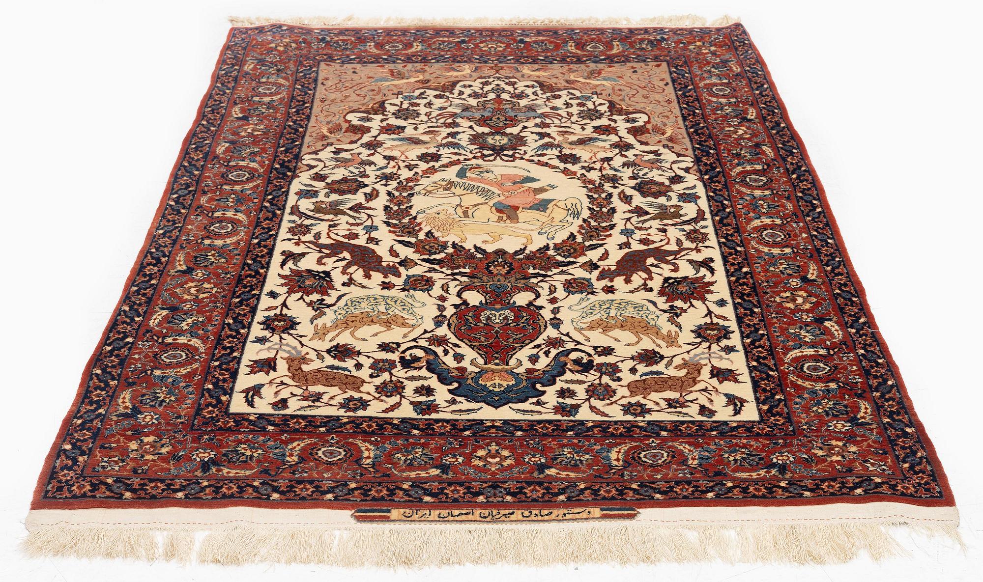 A semi-antique pictorial Isfahan rug signed (Sadegh) Seirafian, c. 170 x 116 cm.