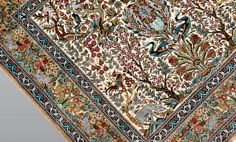 A pictoral oriental silk rug, 94 x 92 cm.