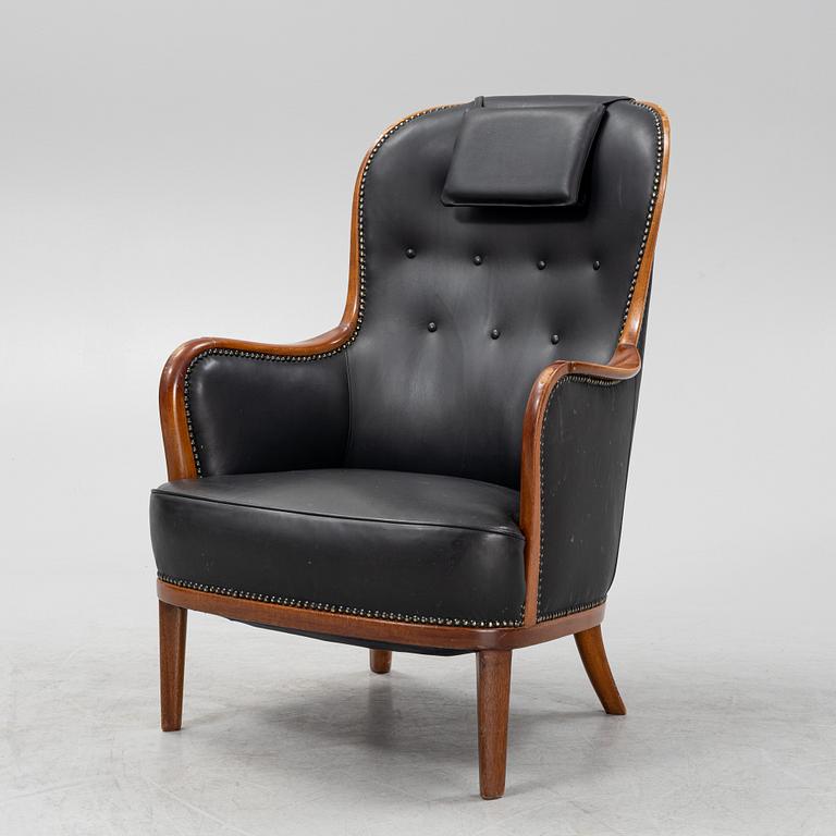 Carl Malmsten, a mahogany 'Advokaten' armchair.
